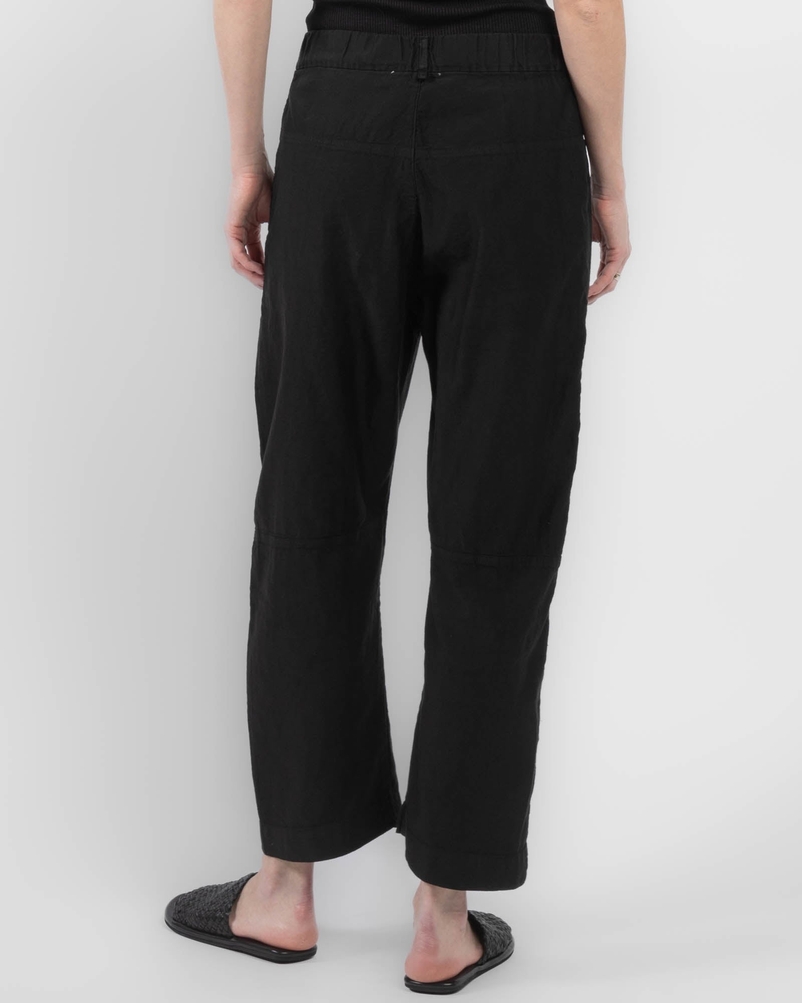 Pantalon à jambes courbées