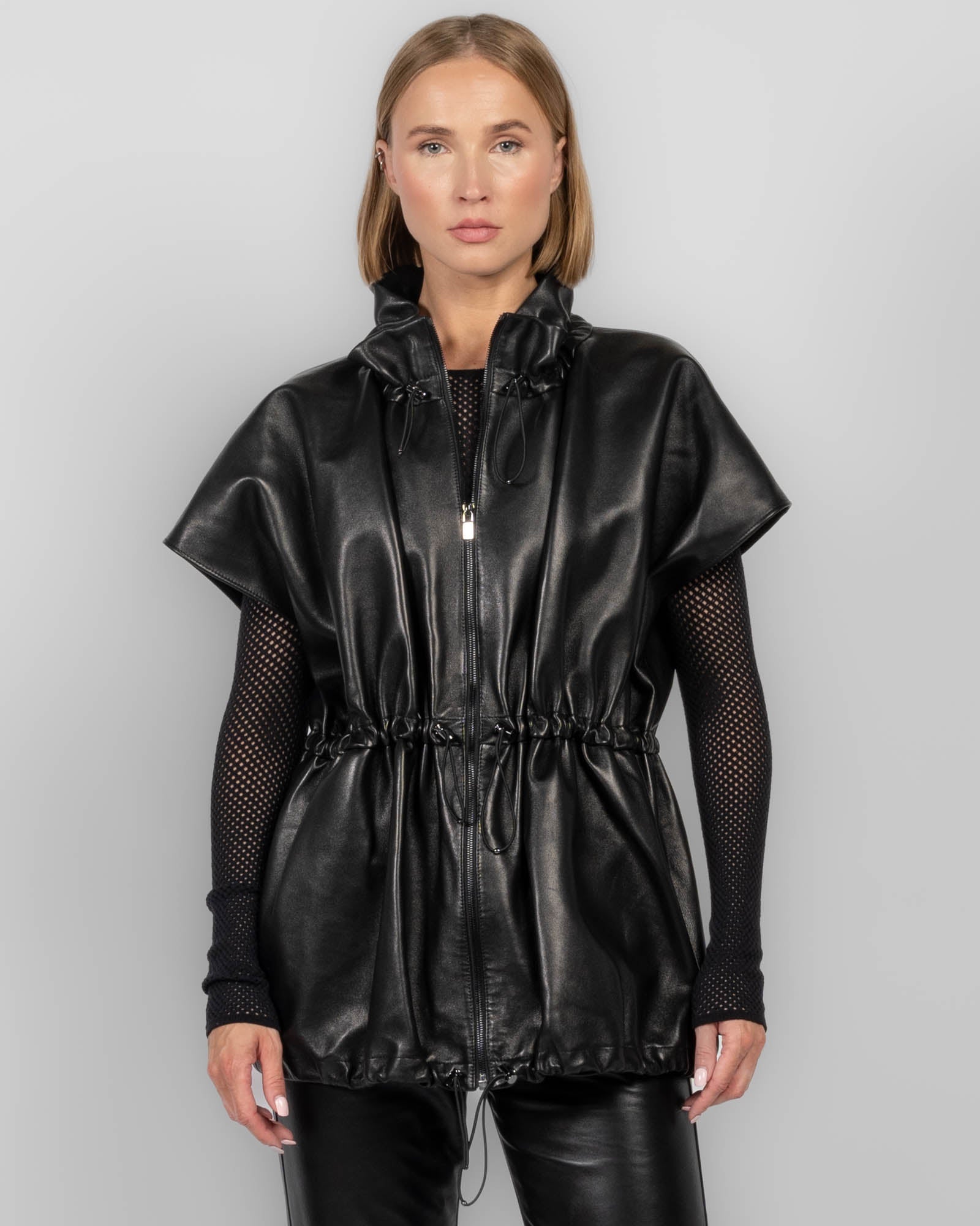 Veste péplum en cuir