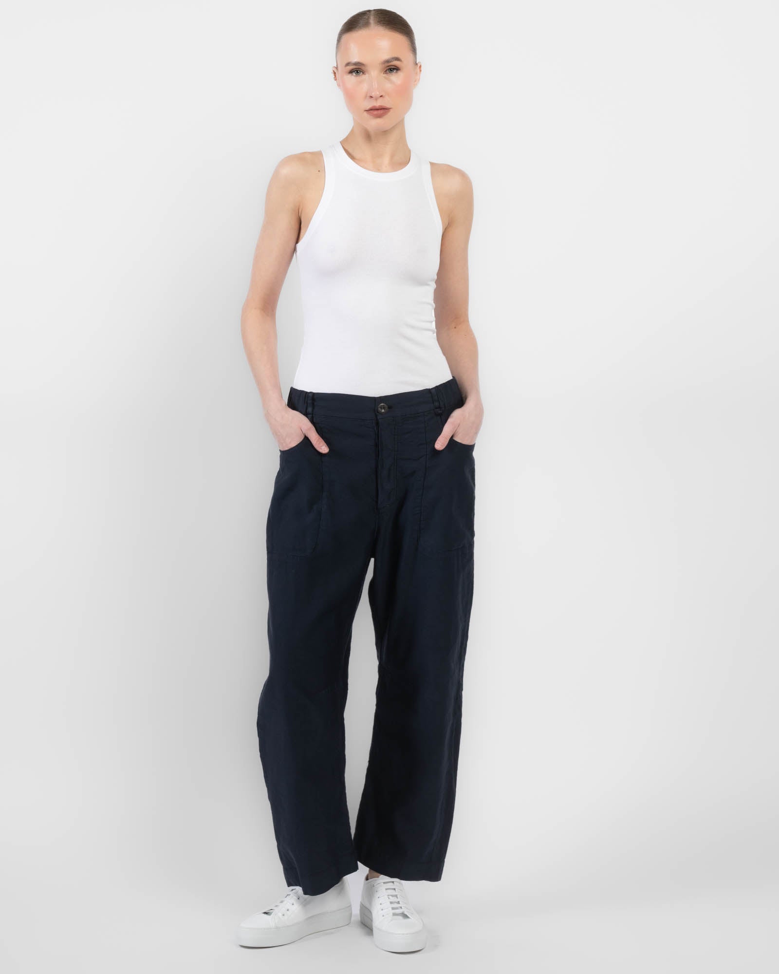 Pantalon à jambes courbées