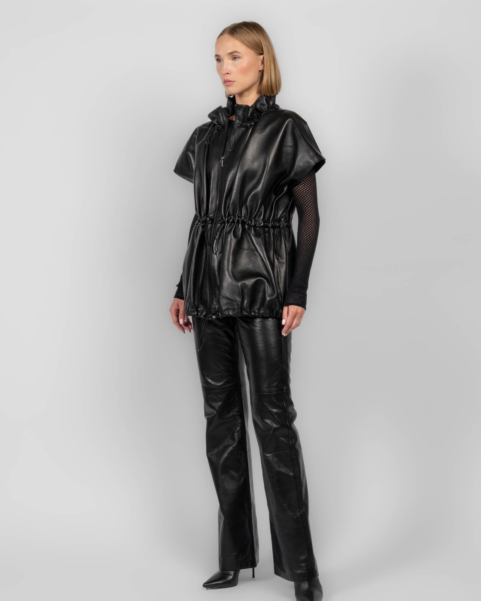 Veste péplum en cuir