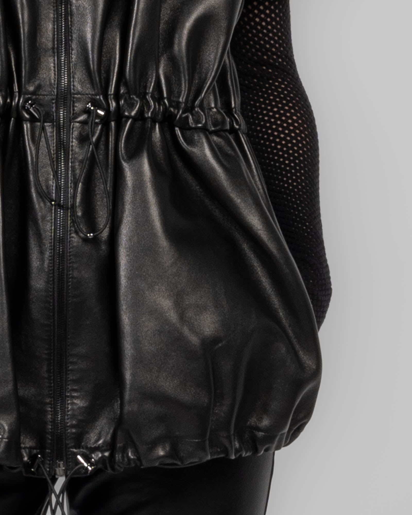Veste péplum en cuir