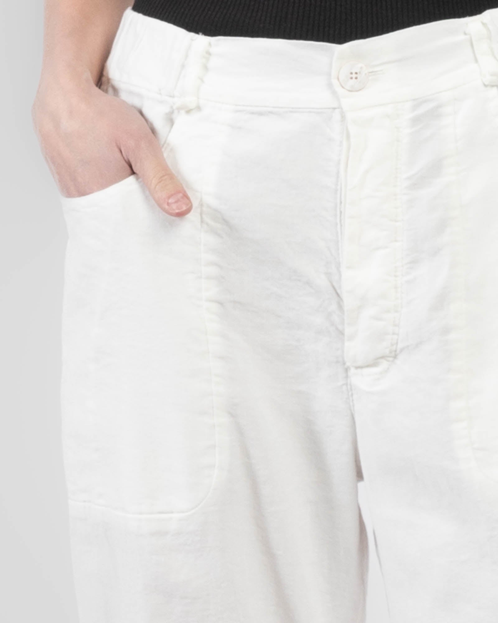 Pantalon à jambes courbées