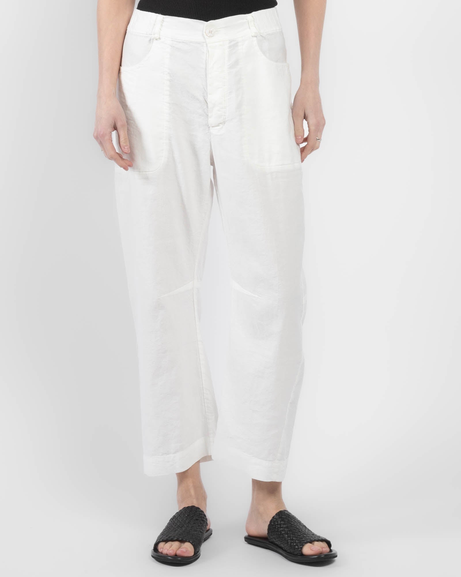 Pantalon à jambes courbées