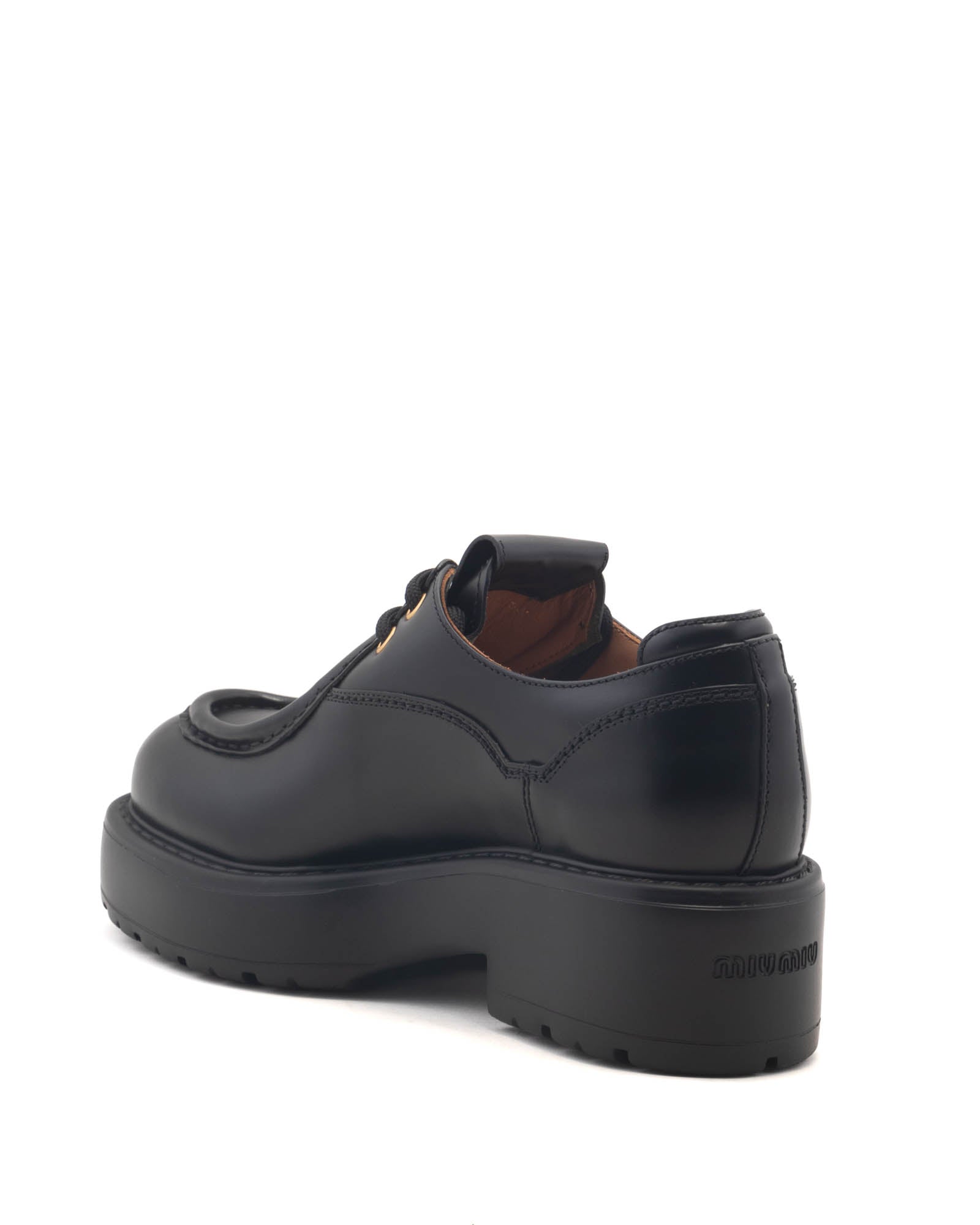 Mocassins à talons crantés