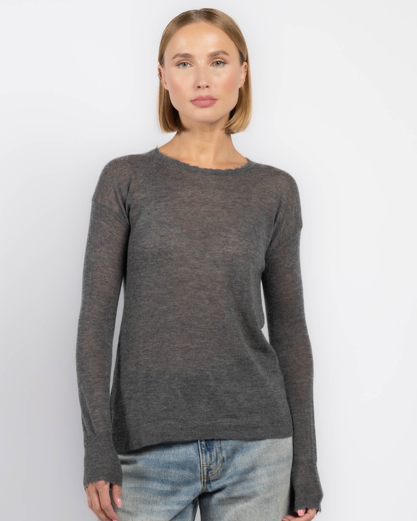 Pull ras du cou à bords bruts