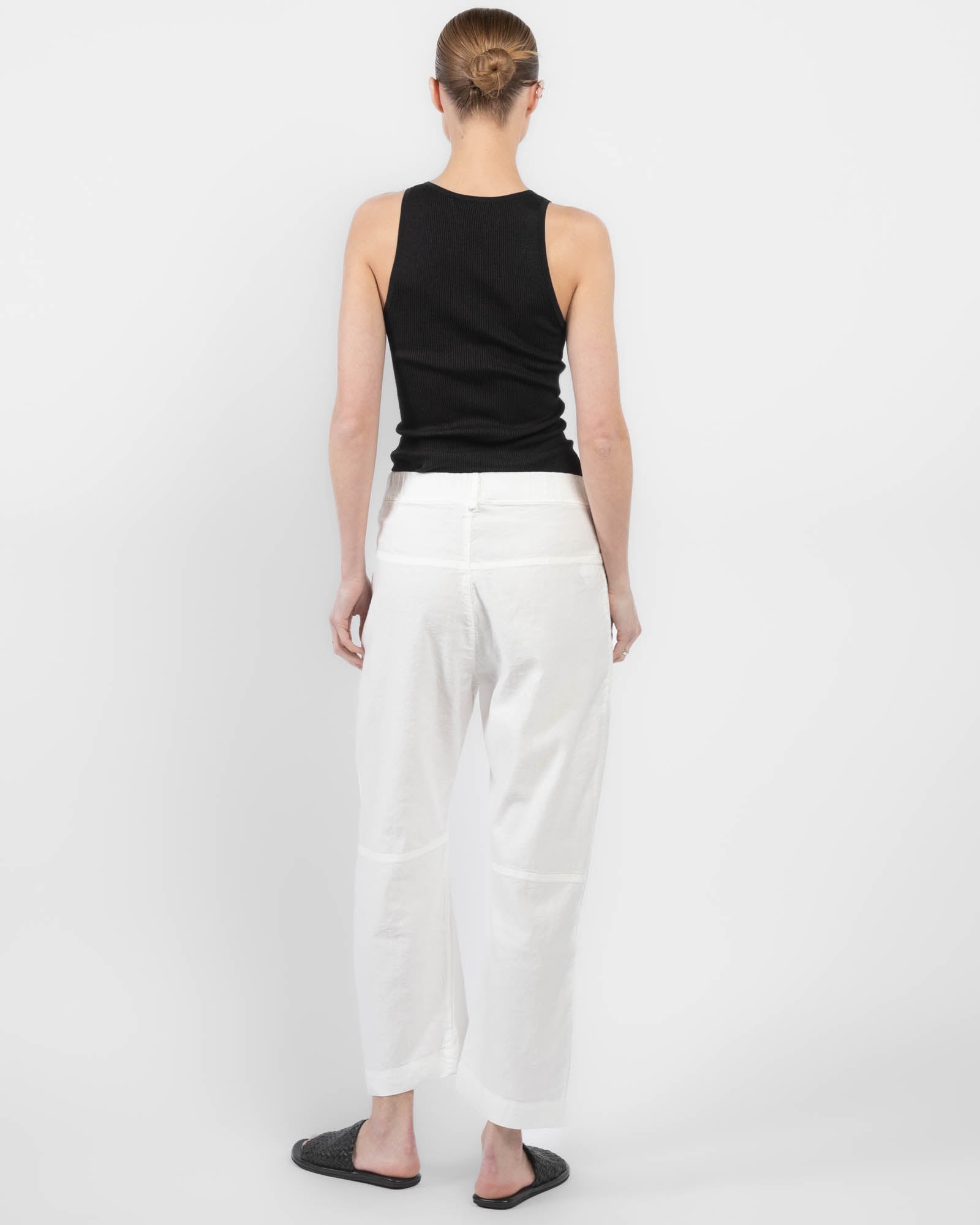 Pantalon à jambes courbées