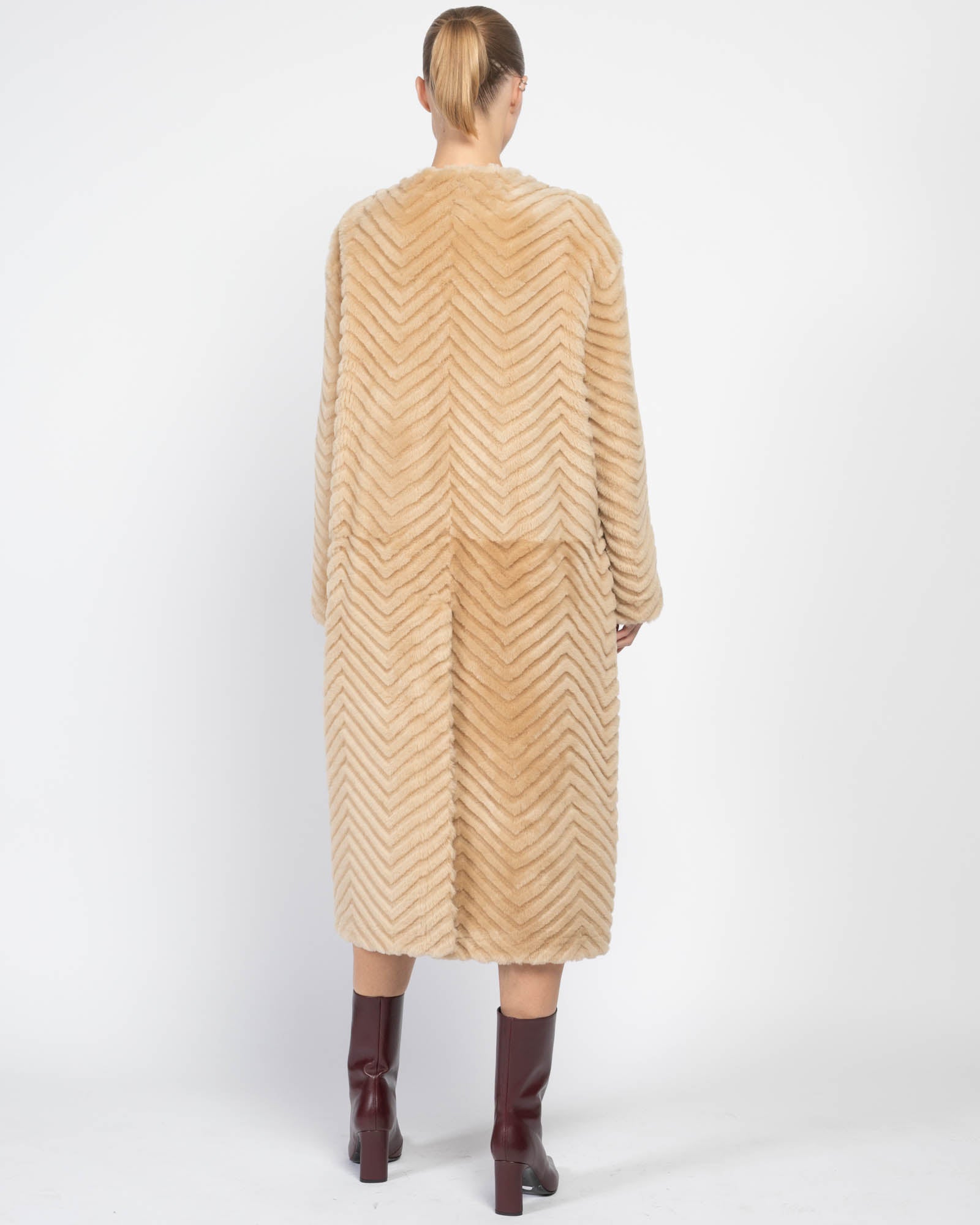 Manteau en peau lainée