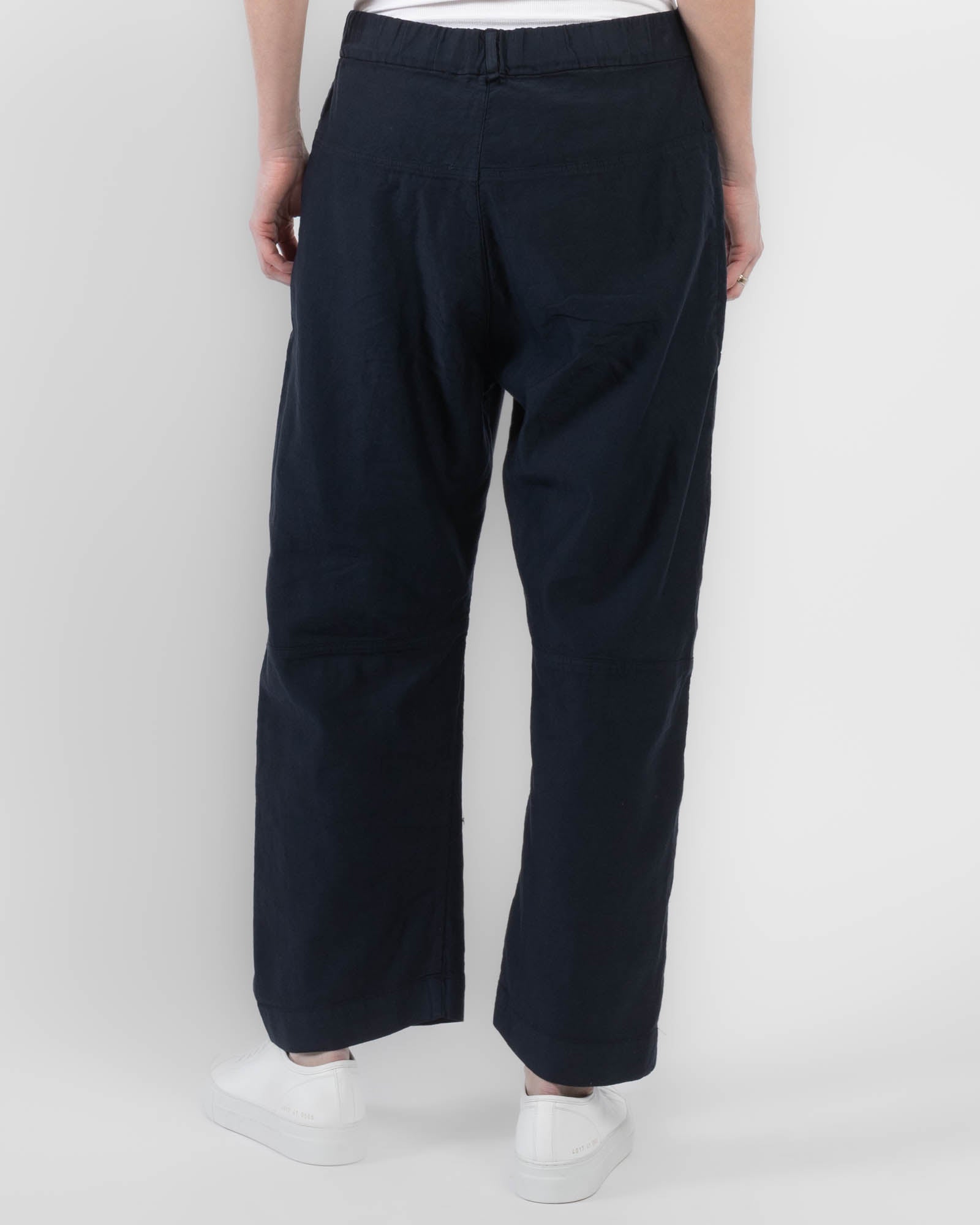 Pantalon à jambes courbées