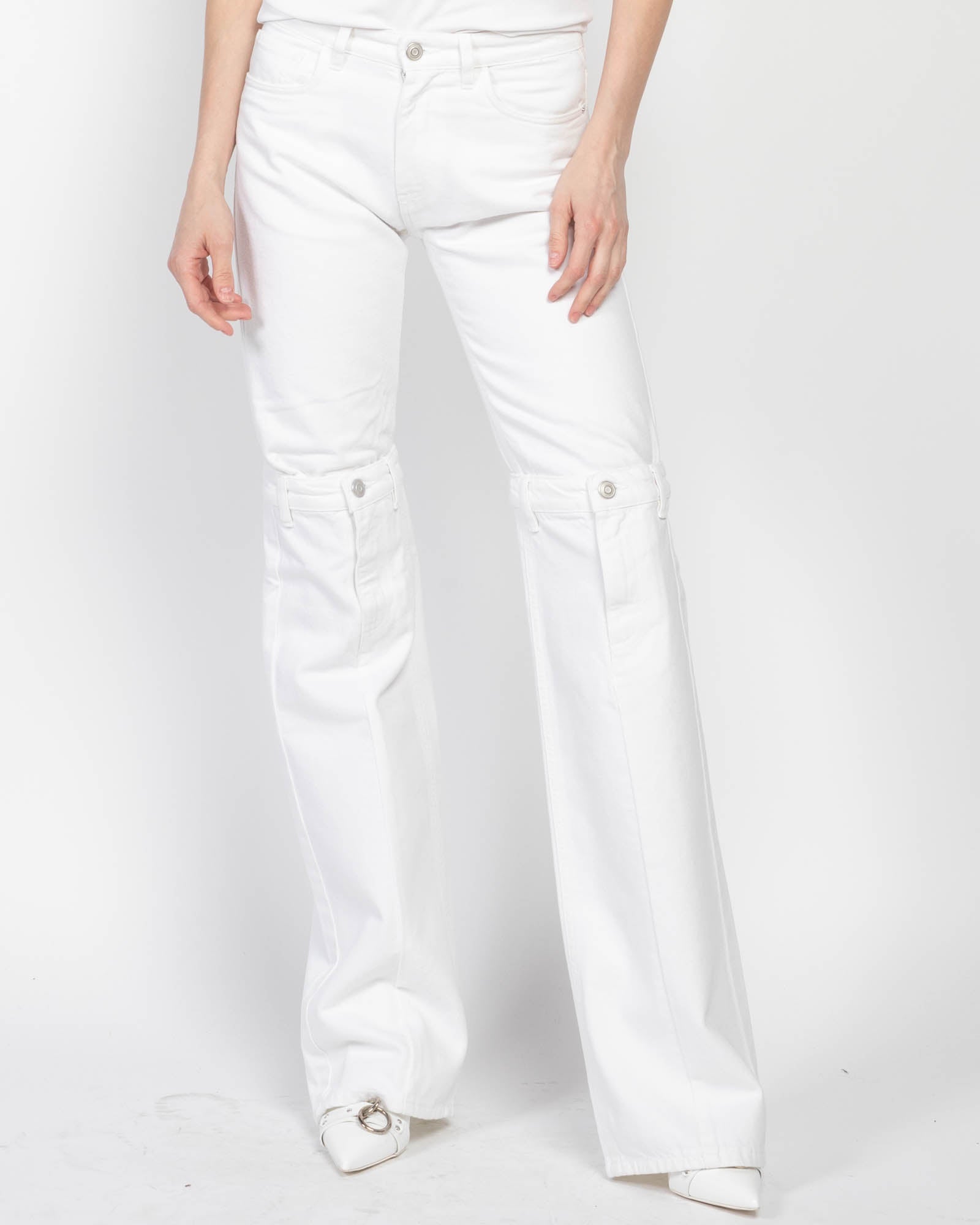 Jean ouvert au genou