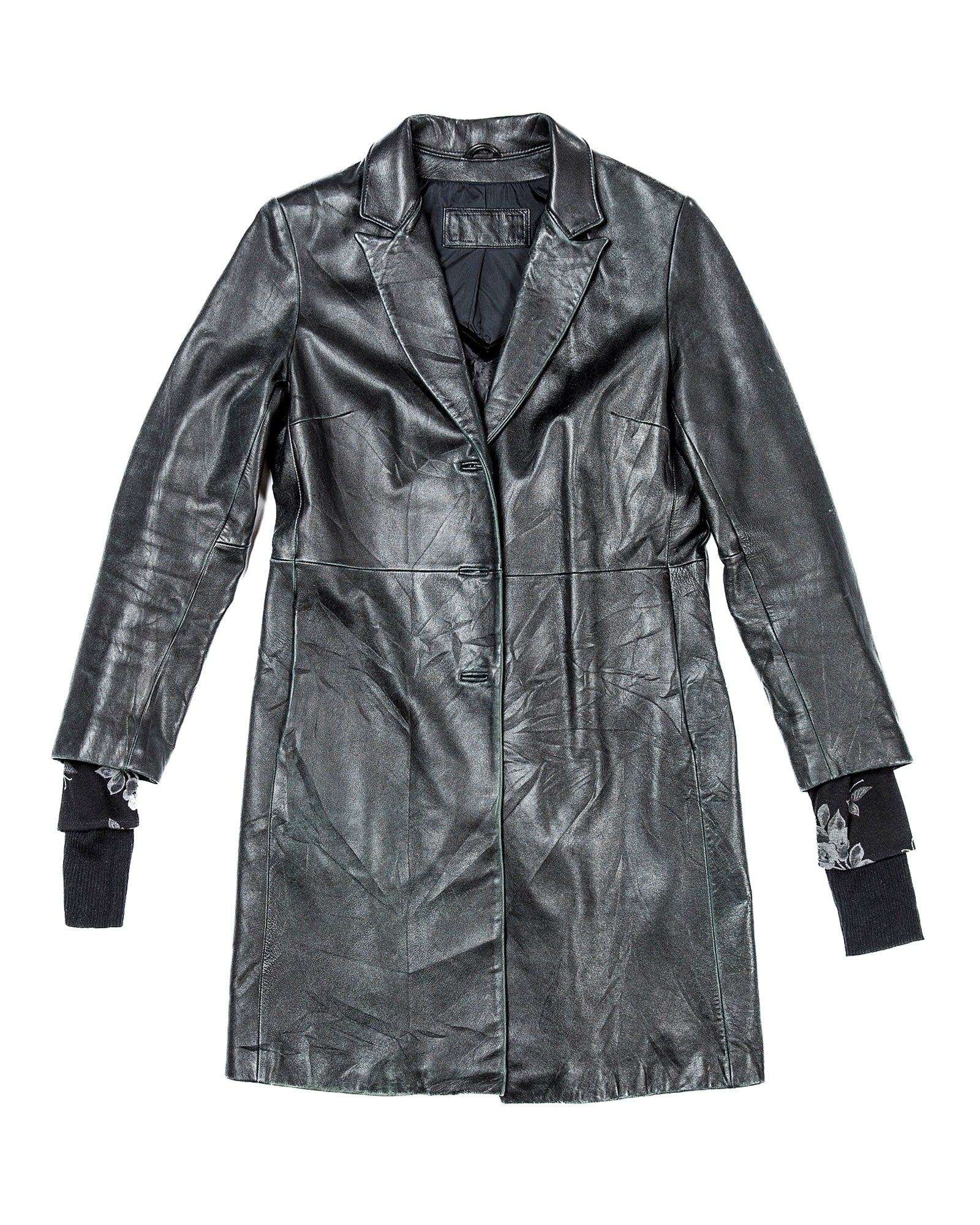 Veste en cuir noir et blanc cassé