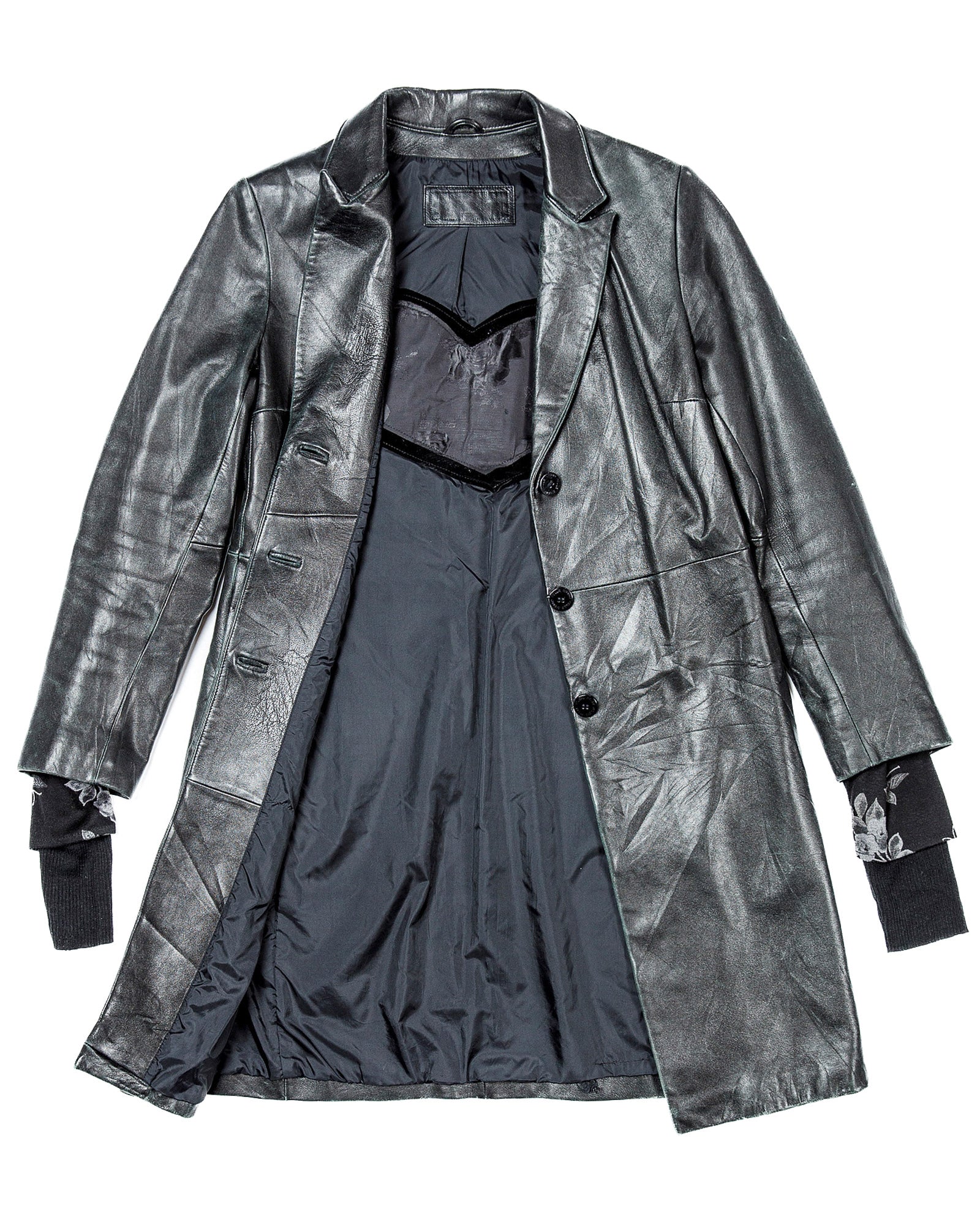 Veste en cuir noir et blanc cassé