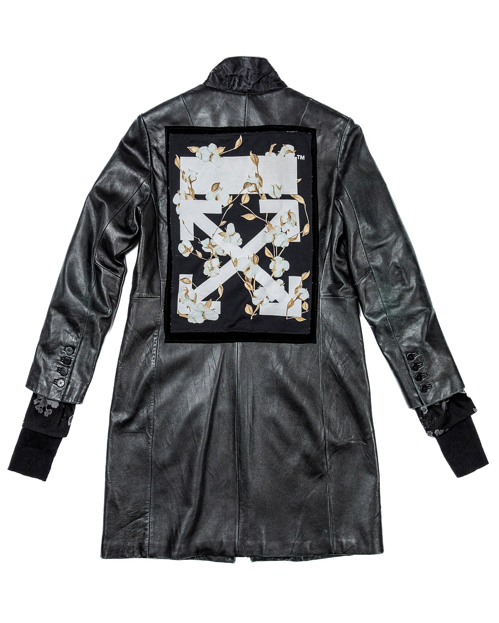 Veste en cuir noir et blanc cassé