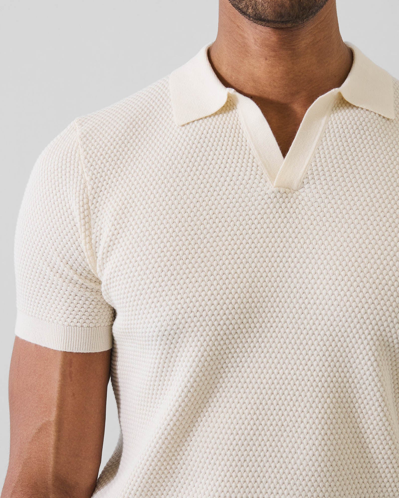Cotton-Blend Bubble Stitch Knit Open Polo