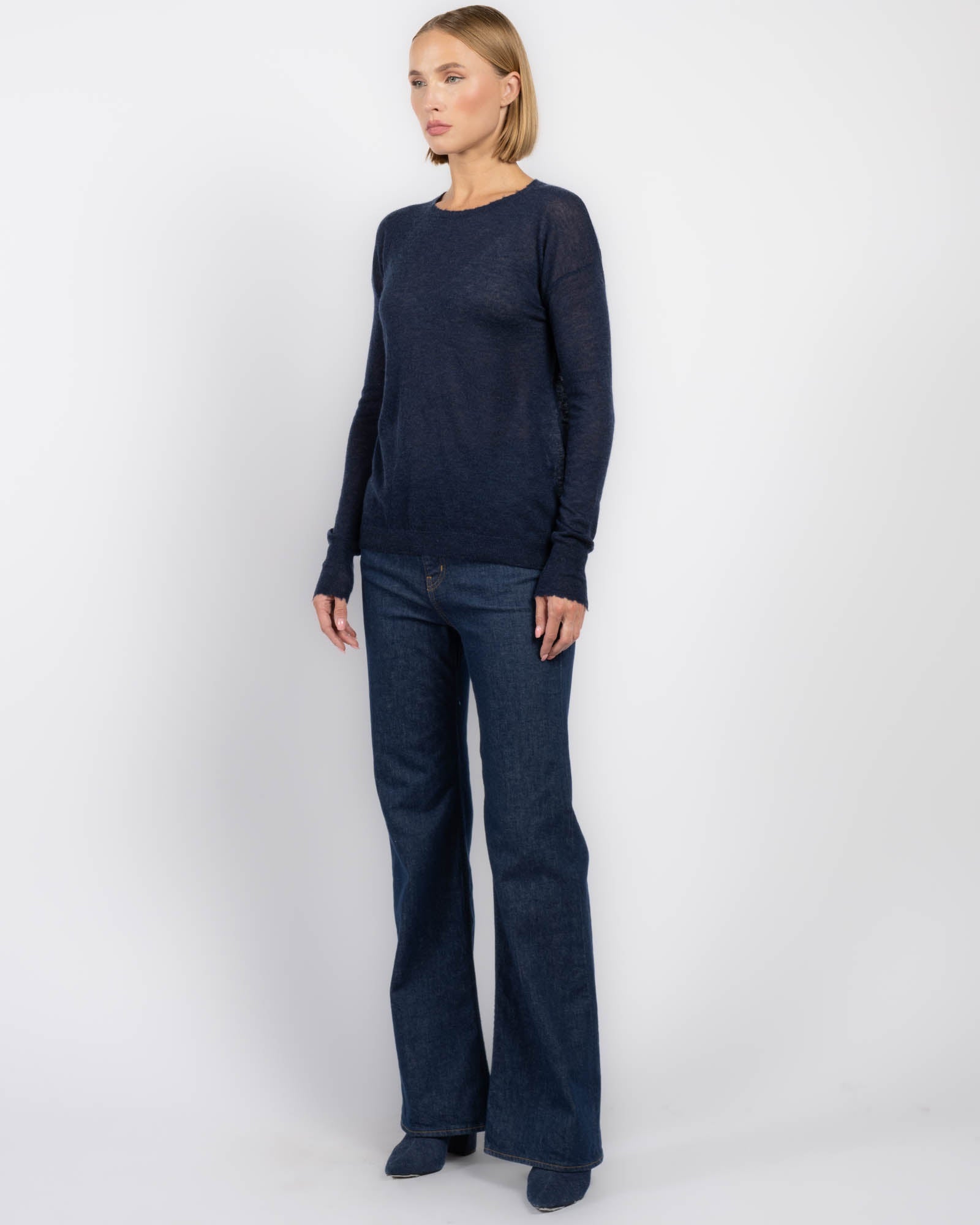 Pull ras du cou à bords bruts