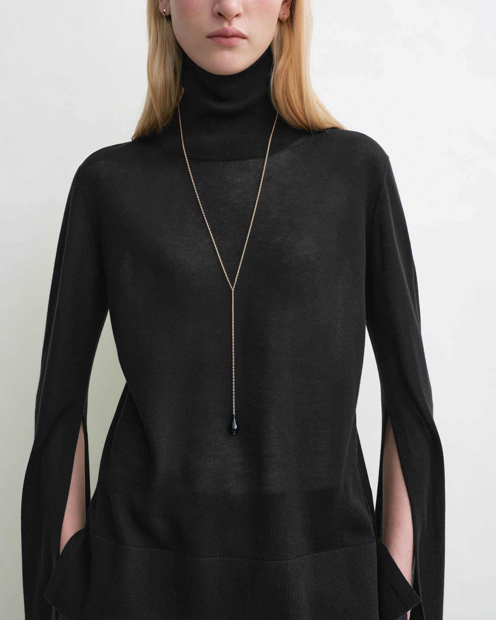 Slit Sleeve Turtleneck