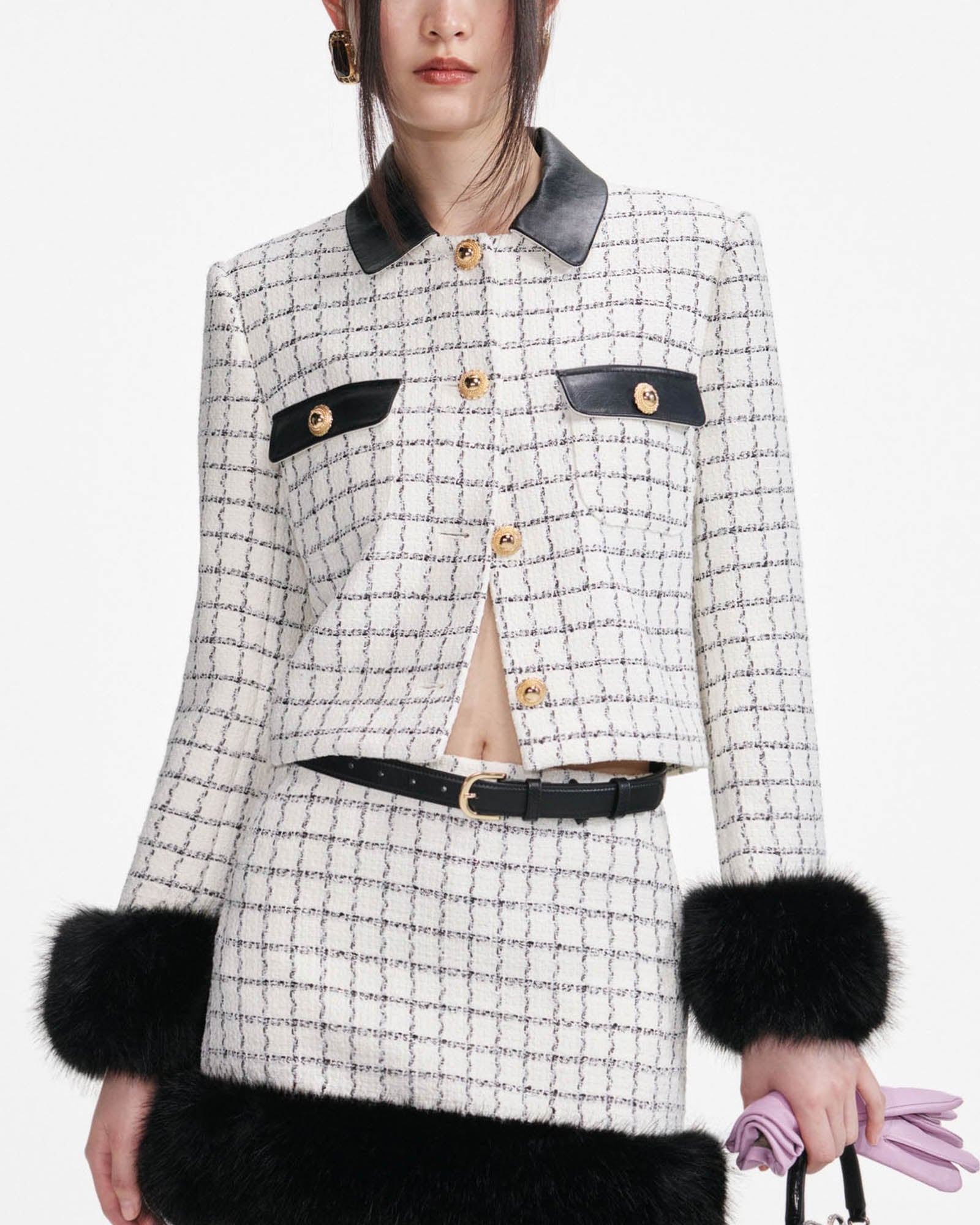 Veste à revers en fourrure bouclée à carreaux